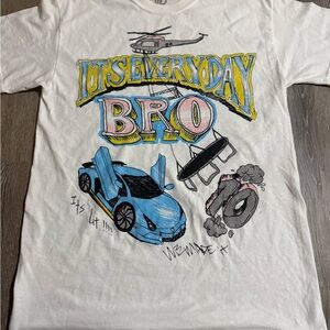 White Graphic Tee with Blue and Yellow Accents